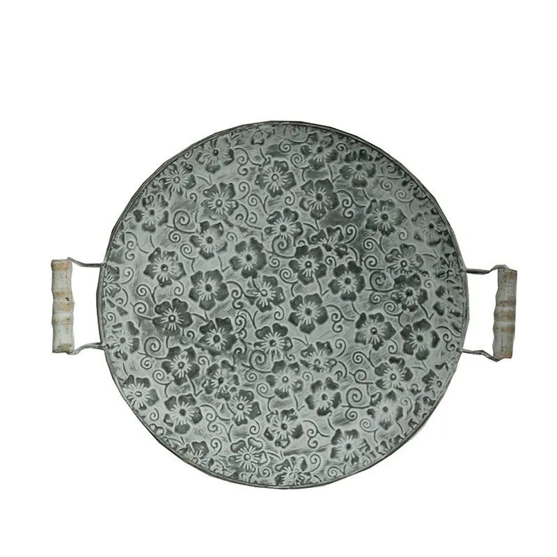 Round European-style wrought iron belt storage tray in two size options.