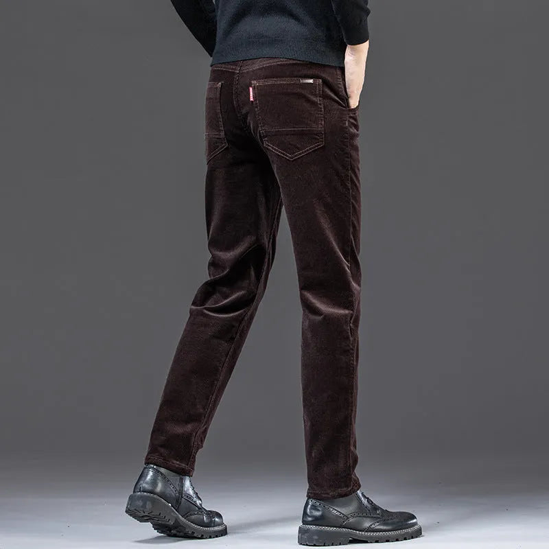 Straight slim-fit cotton corduroy trousers in brown, shown from front
