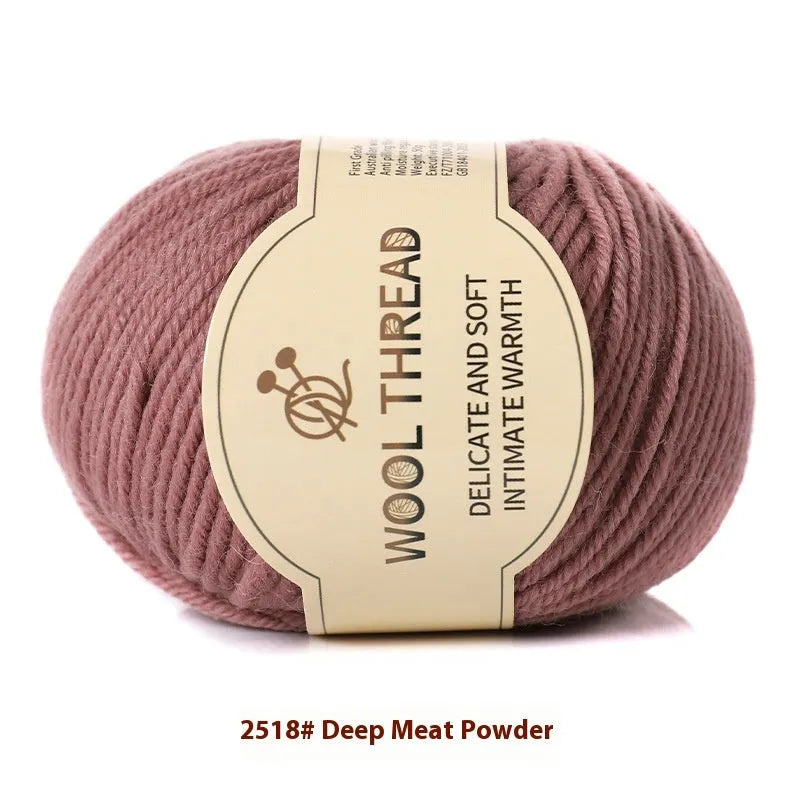Roll of domestic wool knitting yarn for 10 needles in various colours including green, red, and blue