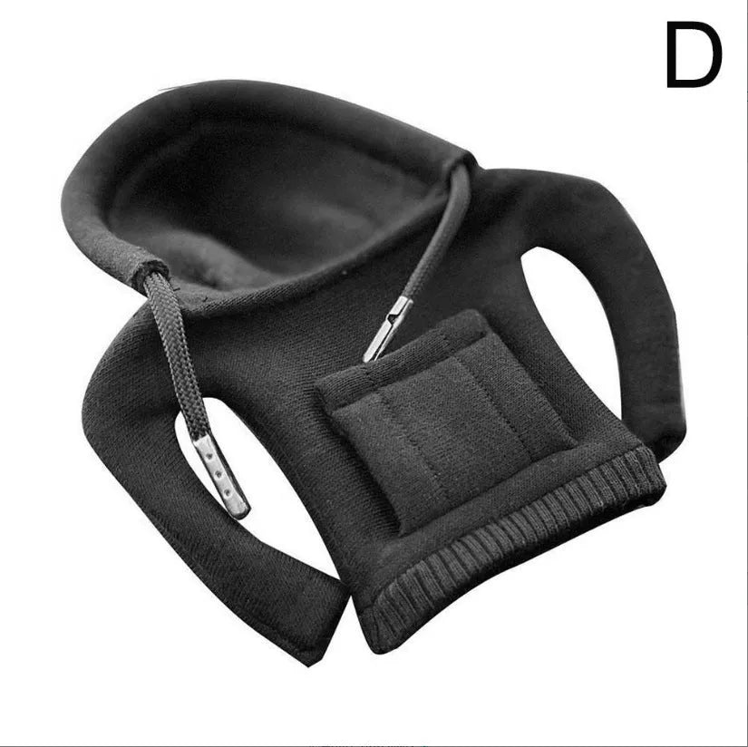 Cloth gear shift knob hoodie cover in assorted colours, shown next to a car gear stick.