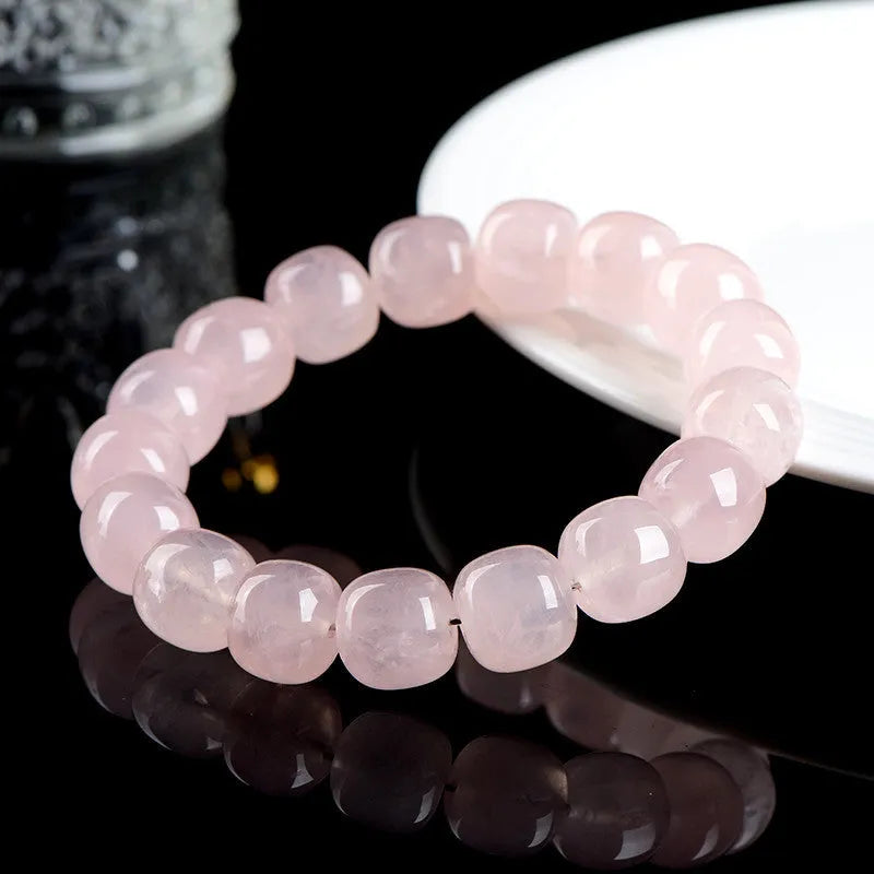 Pink crystal barrel bead bracelet with 11x12mm geometry beads and grinding finish