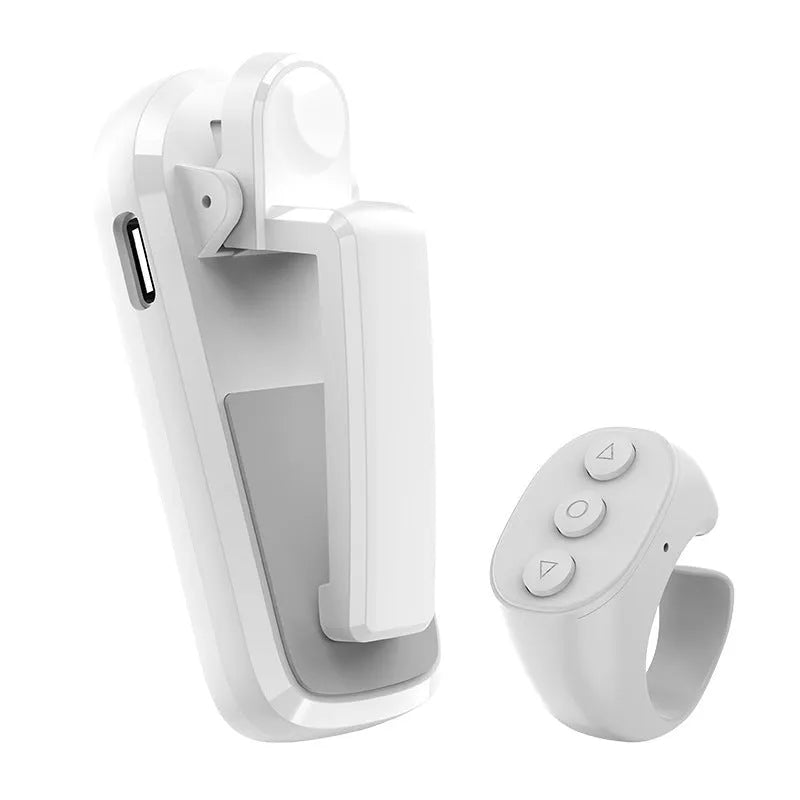 Wireless page turner remote control with clicker attachments in black, white, and pink colours