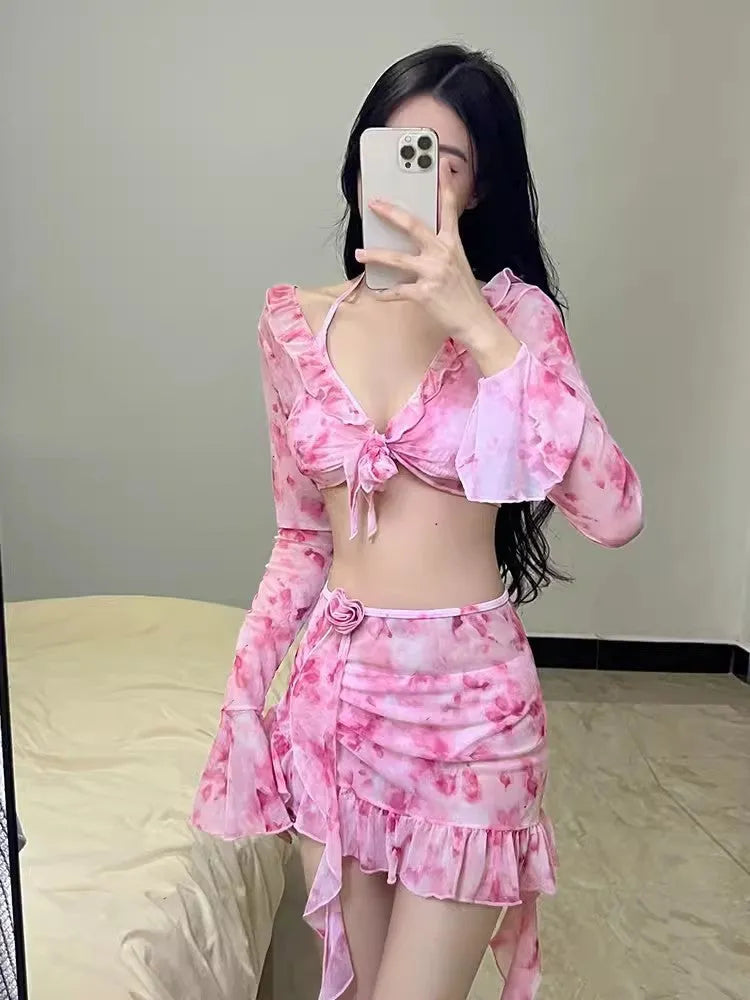 Women's cherry blossom pink floral polyester bikini set for beachwear.