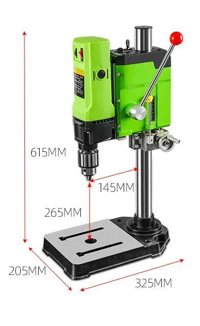 Bench drill milling machine on a workbench with cross bench pliers.