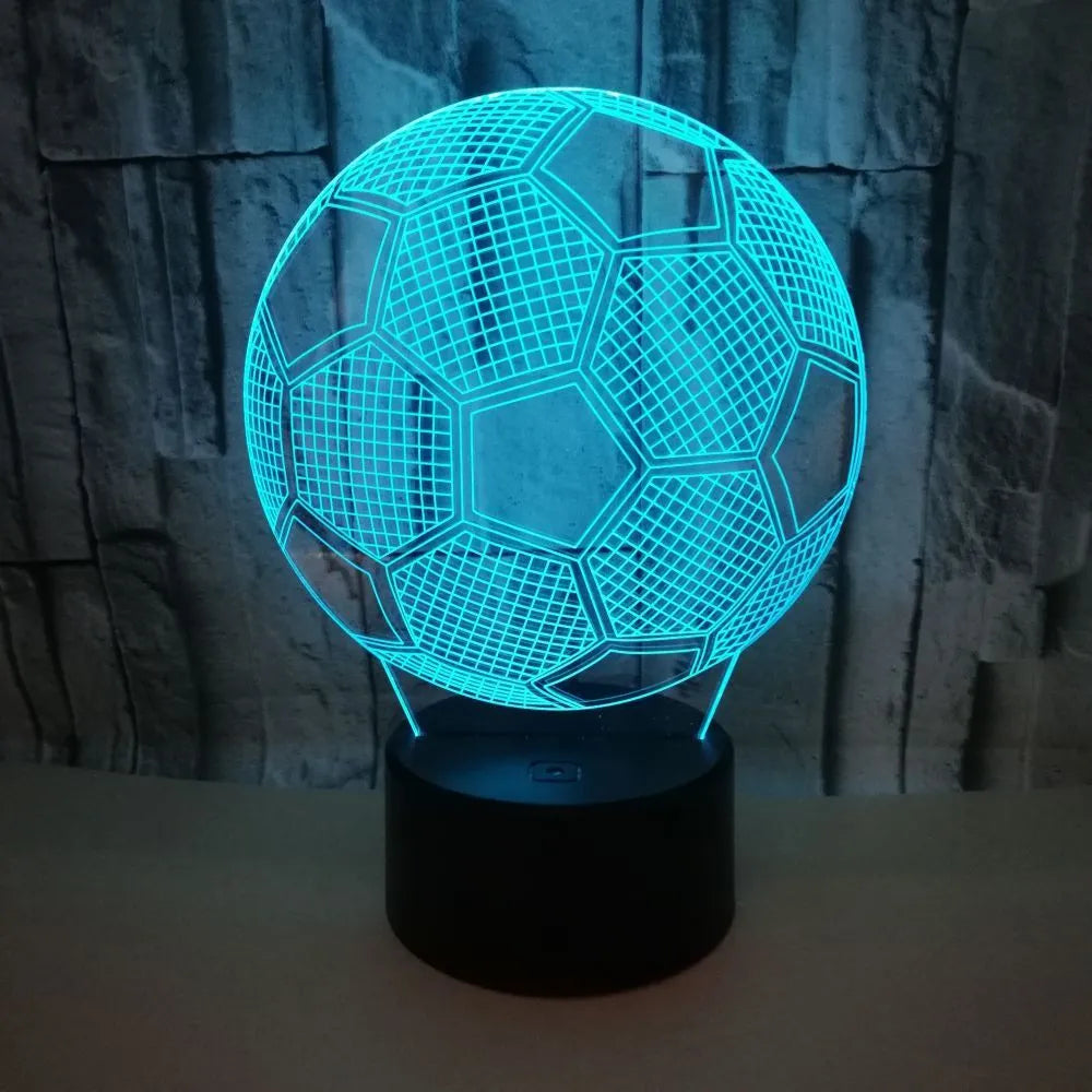 3D football-shaped night light with colourful LED illumination on an ABS base.