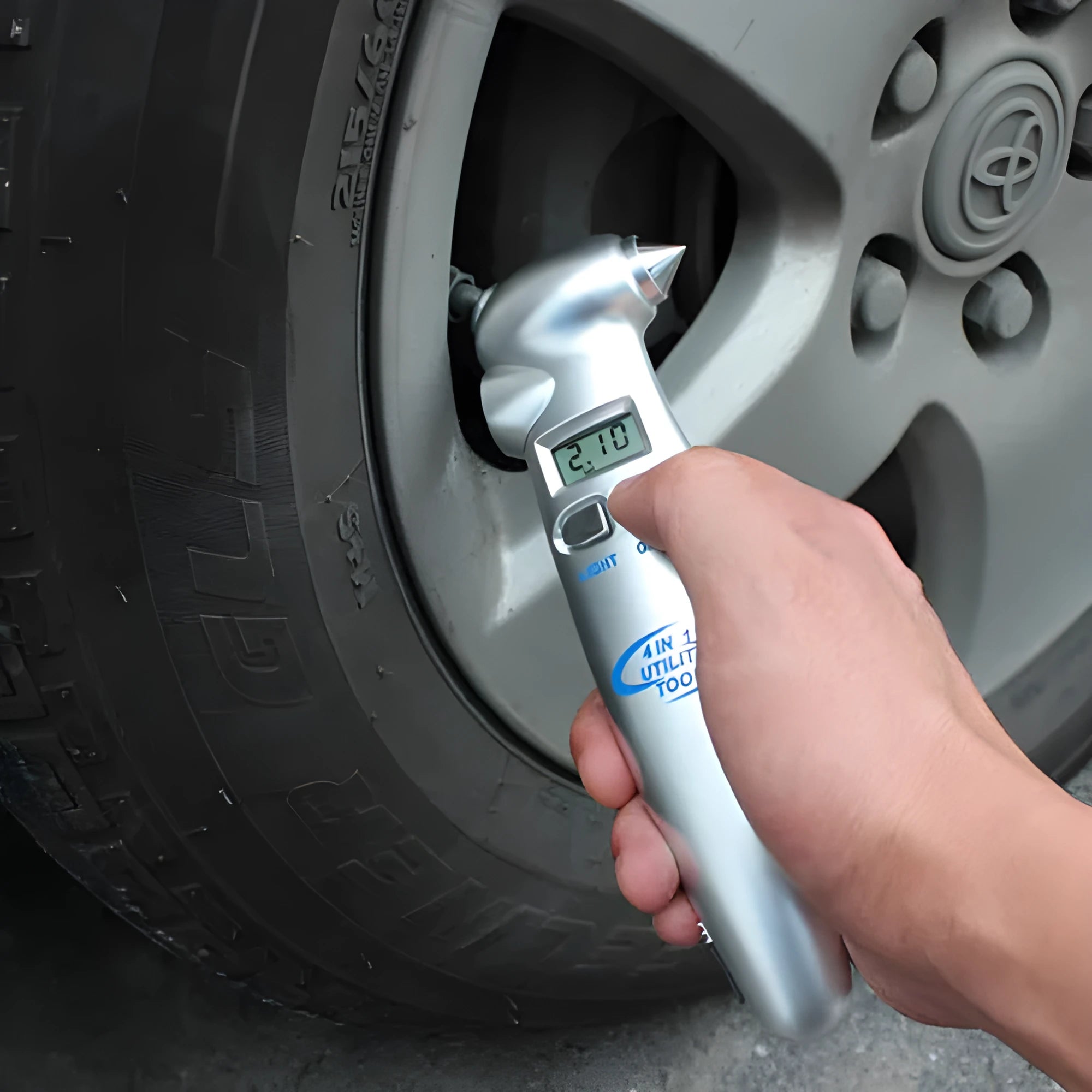 Four-in-one digital tyre pressure gauge with stainless steel safety hammer and emergency light in silver colour