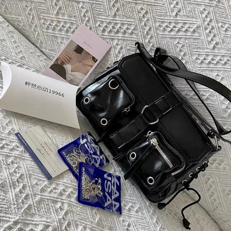 Black PU leather women's baguette messenger bag with adjustable crossbody strap