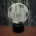 3D football-shaped night light with colourful LED illumination on an ABS base.