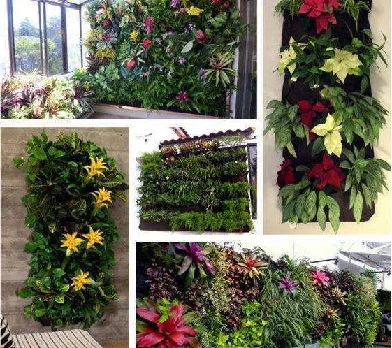 Vertical wall garden planting bag with multiple pockets for herbs and flowers hanging on fence
