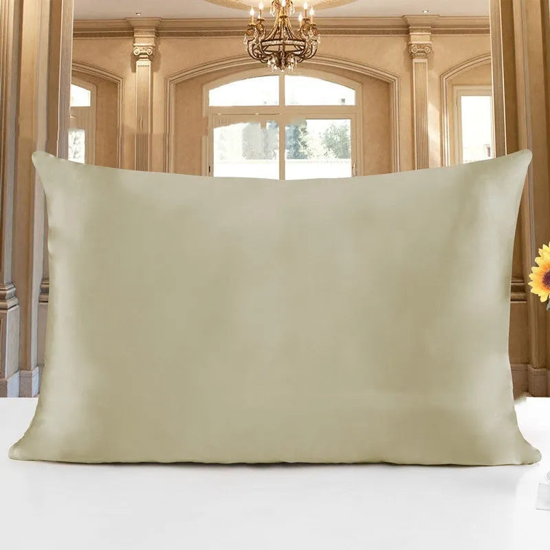 Double-sided 19 M silk pillowcase in apricot colour, showing smooth satin weave texture.