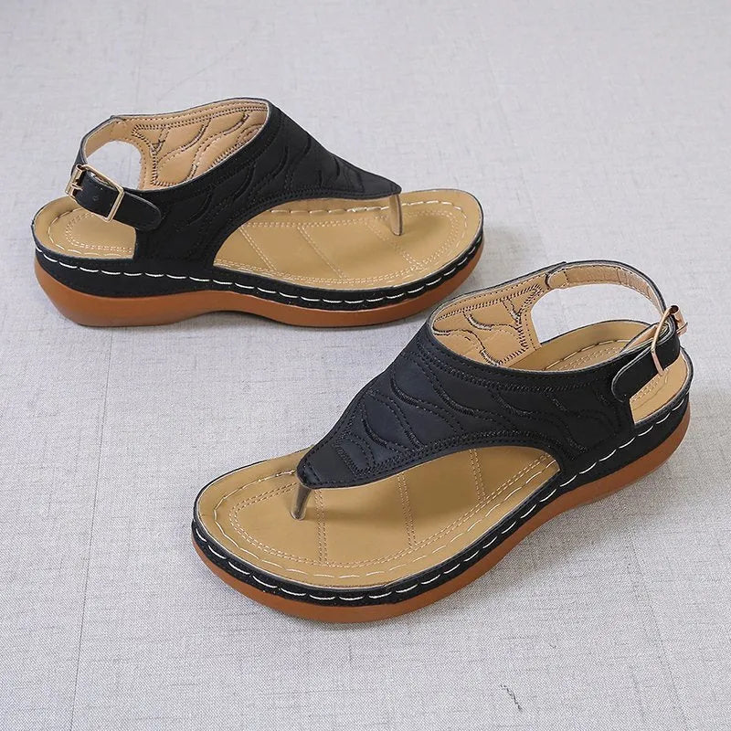 Women's casual wedge heel flip flop sandals with adjustable back strap in red vegan leather