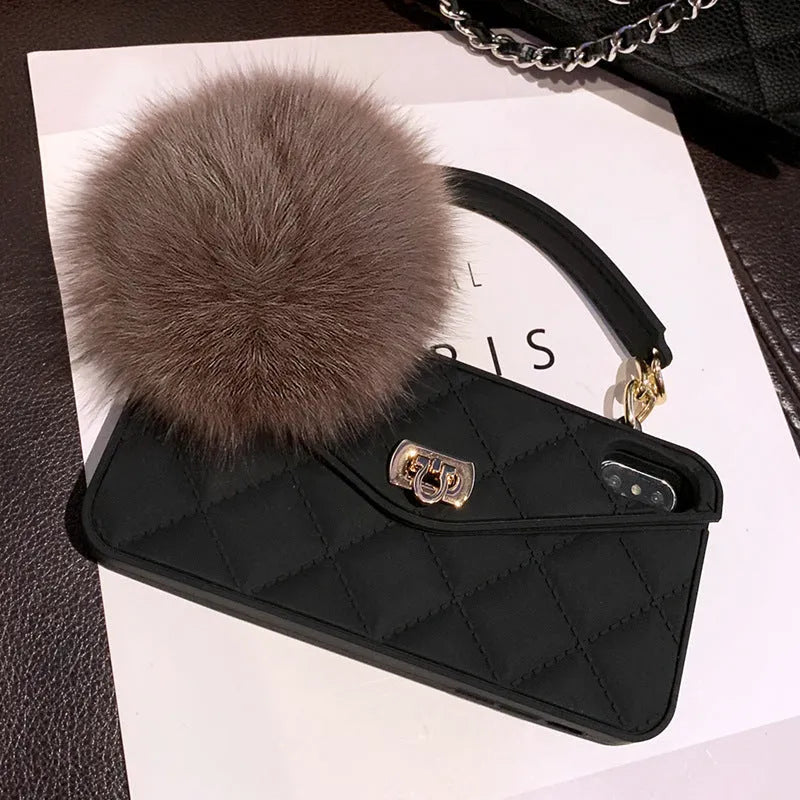 TPU iPhone mobile case with plush hairball grid texture in dark green, shown on a phone.