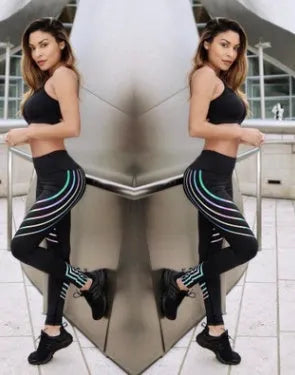 Women's black and white print workout leggings with slim fit pencil pants design.