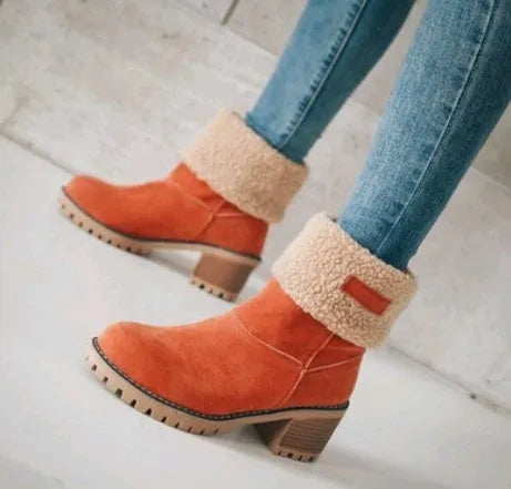 Women's mid-calf suede snow boots with a low flat heel and round toe, shown in available colours.