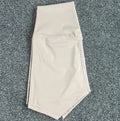 Ladies high waist yoga shorts in nylon fabric, shown in multiple colour options.