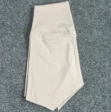 Ladies high waist yoga shorts in nylon fabric, shown in multiple colour options.