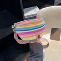 Blue straw woven shell-shaped beach bag with single shoulder strap and bohemian design
