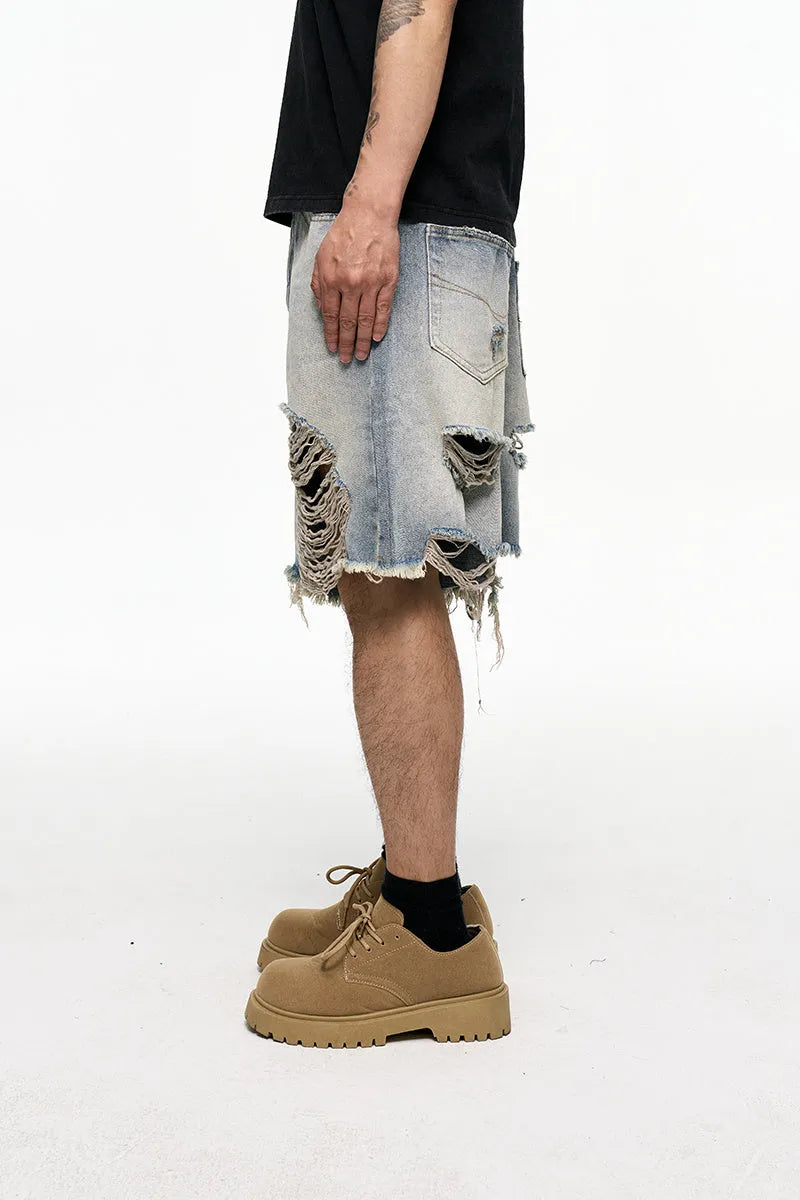 Men's light blue retro washed baggy denim shorts with wide leg and zipper fly