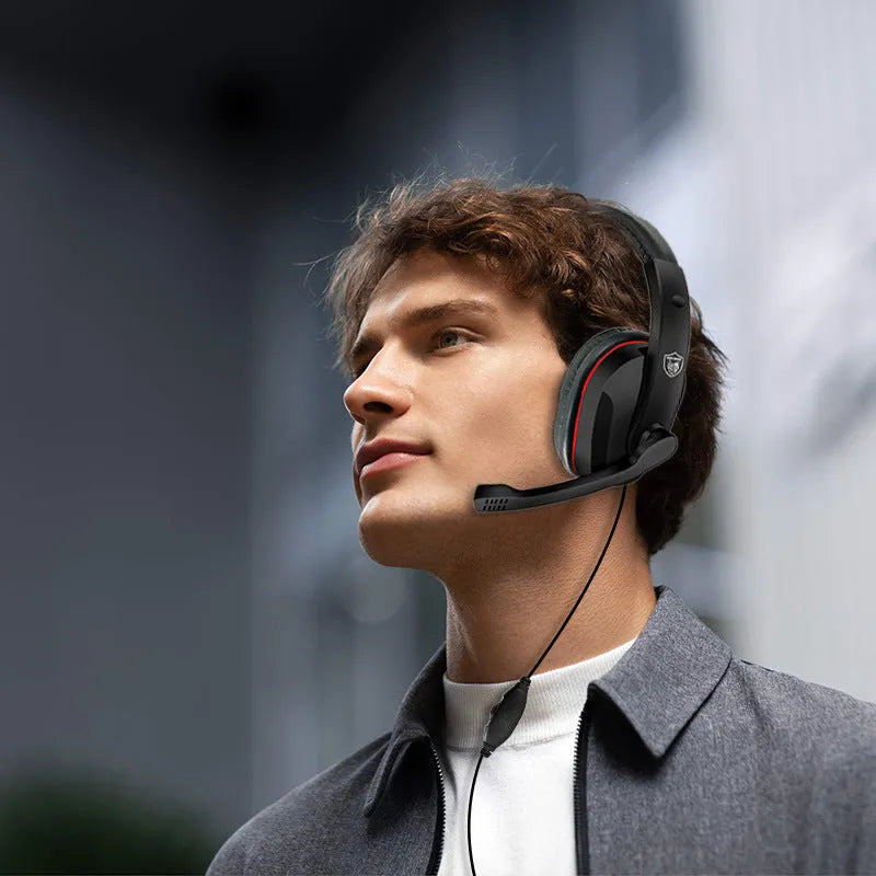 Black wired gaming headset with over-ear cups and a straight 6.3mm audio plug on a 1.2m cable.