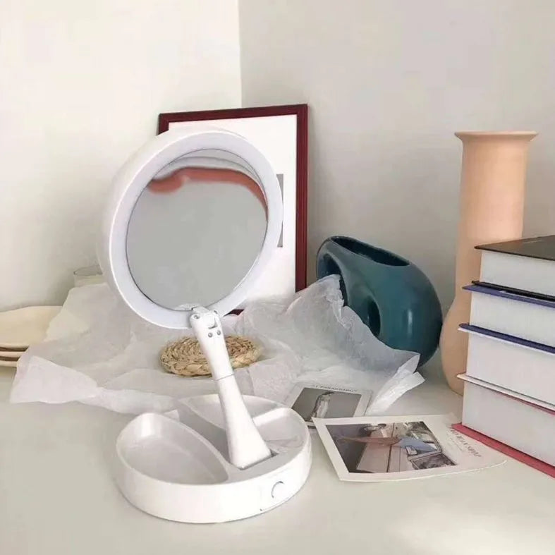 White acrylic vanity mirror with LED lights, double-sided magnification, and foldable design