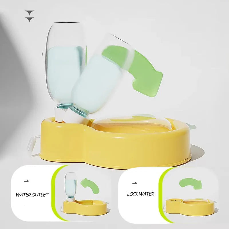 Green portable dog travel cup with pull-out bowl and handle, shown next to a backpack.