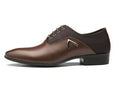 Men's black Oxford shoe with a low upper and rubber sole on a white background.