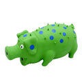 Blue pig-shaped latex dog chew toy with squeaker for aggressive chewers and teeth cleaning