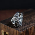 Personalised Jibeast pattern open style silver diamond ring on a hand.