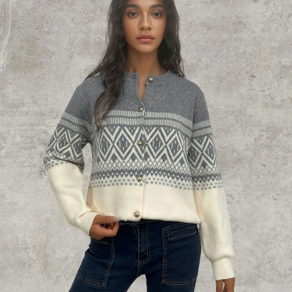 Women's long-sleeved grey alpaca wool cardigan with contrasting diamond knit pattern.