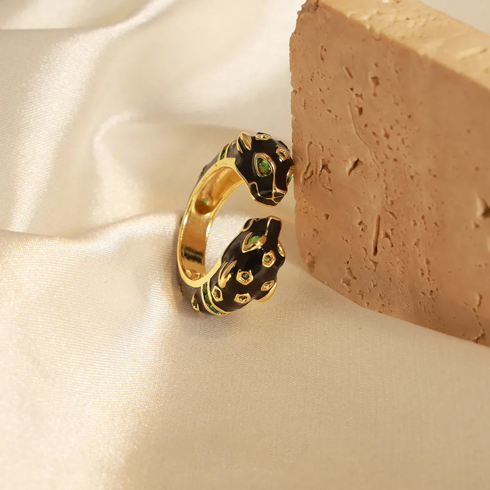 Women's black cheetah print open ring with geometric design and electroplated copper construction