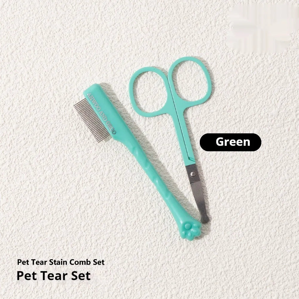Black ABS plastic pet tear stain comb and scissors set on white background