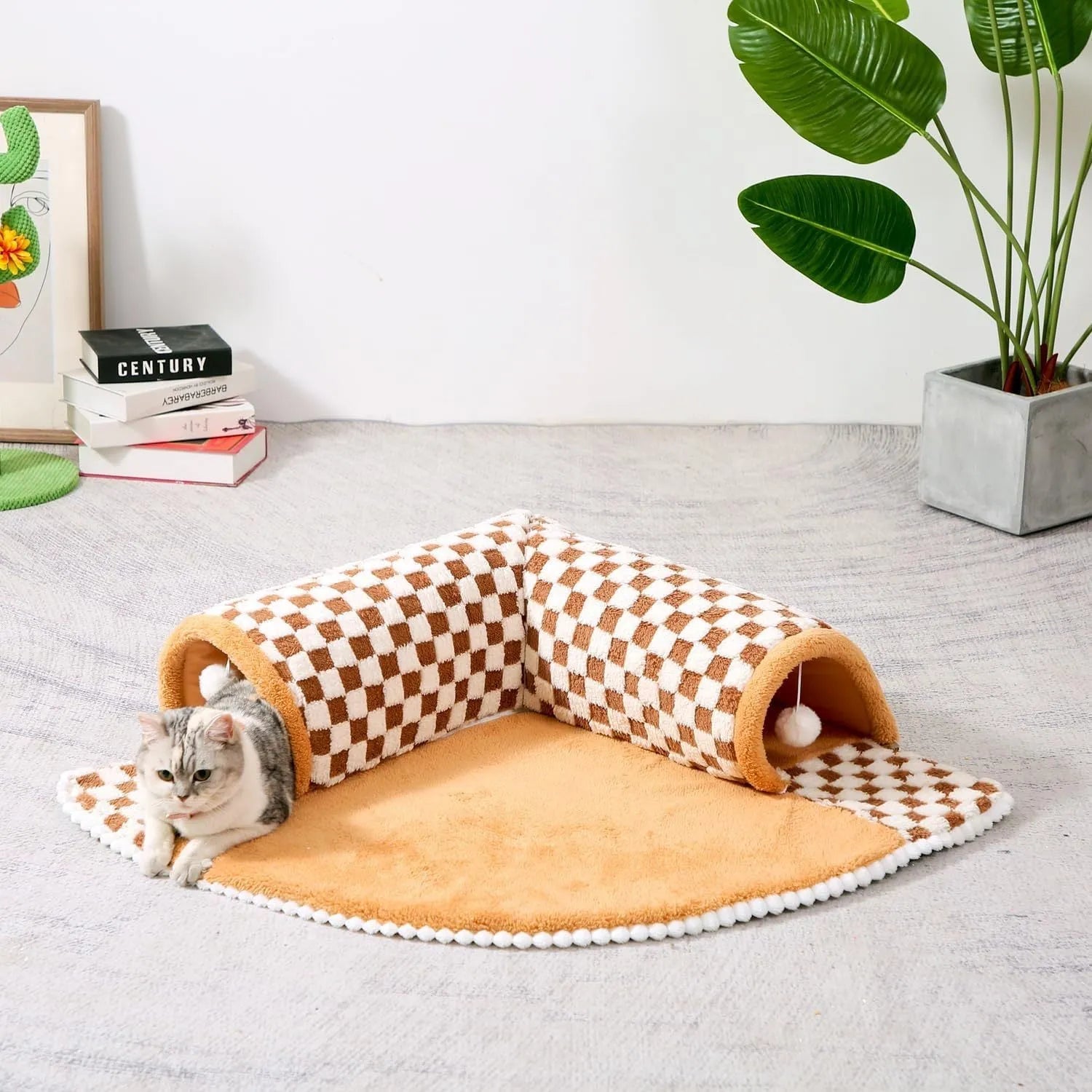 Fan-shaped plush pet bed with integrated tunnel for cats and dogs in coffee colour.