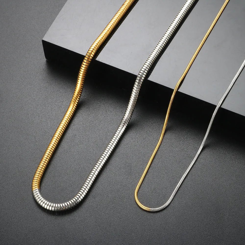 Gold-tone stainless steel snake bones chain necklace with 3mm geometric design for women