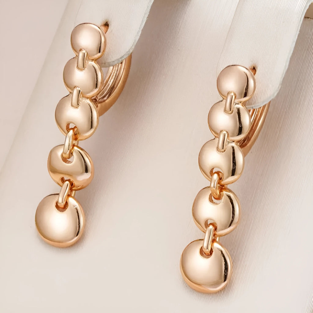 Retro long copper circle earrings with woven wirework and gold-coloured finish