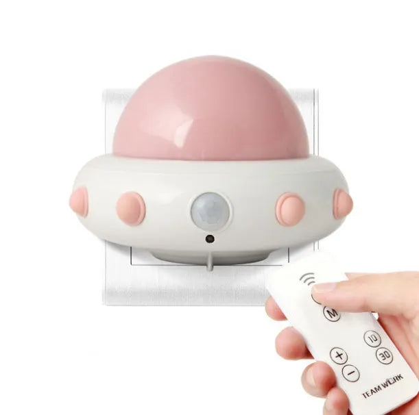 Remote control UFO shaped bedside night light in white, blue or pink colours