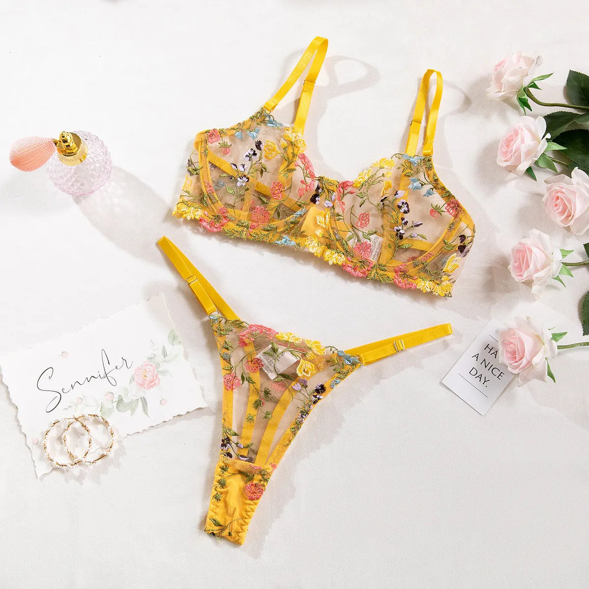 Floral mesh underwear suit with steel ring T-back in skin colour on mannequin