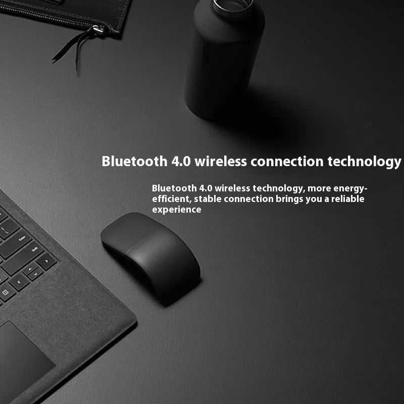 Folding wireless Bluetooth mouse showing compact design with touch surface and portable folded position