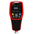 Coating thickness gauge with digital display showing measurement value on a surface
