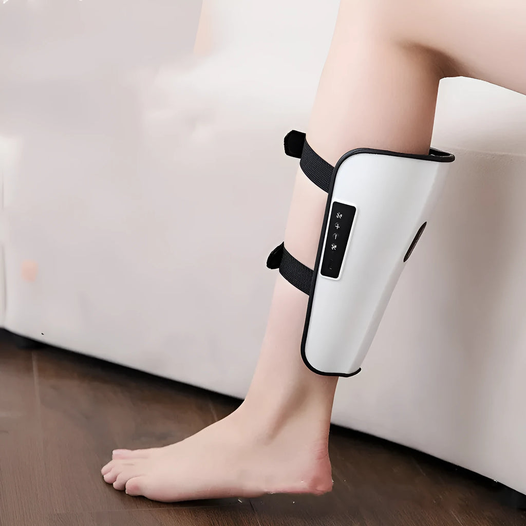 White plastic calf and leg massager unit with mechanical controls for infrared physiotherapy and electrotherapy pulse functions.