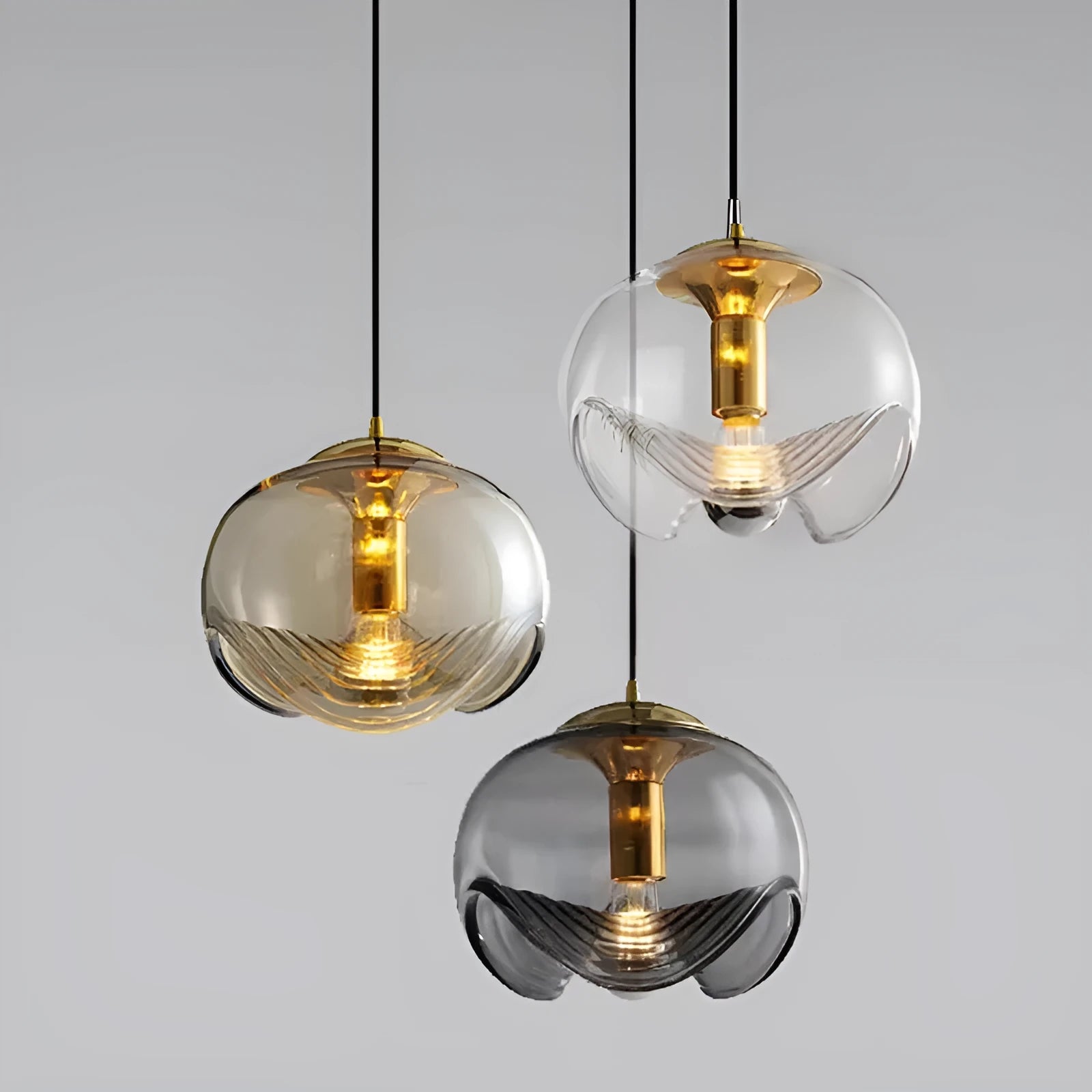Modern minimalist glass bedside chandelier with a 250mm diameter, shown in a transparent light colour option.