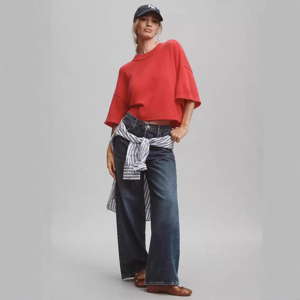Red women's short viscose T-shirt with an exposed navel design on a model