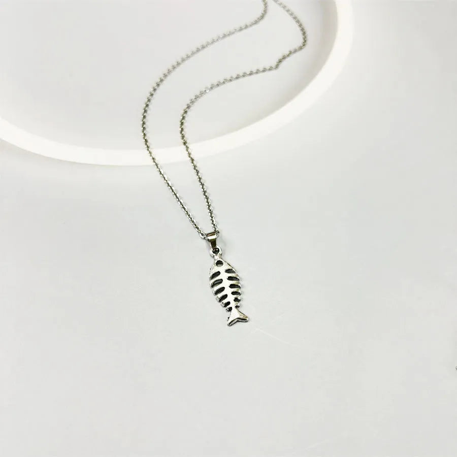 Retro fishbone design alloy necklace and matching earrings set on a dark background.