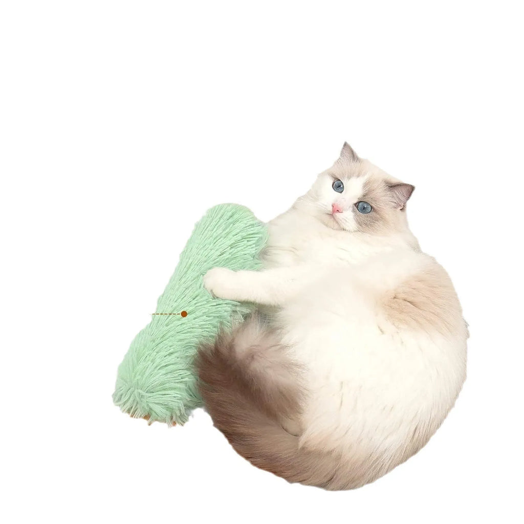 Plush cat toy pillow in blue, green, pink, or white colours measuring 27cm long by 10cm wide