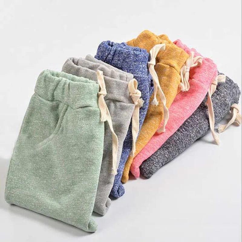 Cotton children's pants for baby girls and boys in multiple colours including blue, pink, and grey, sizes 2T to 6