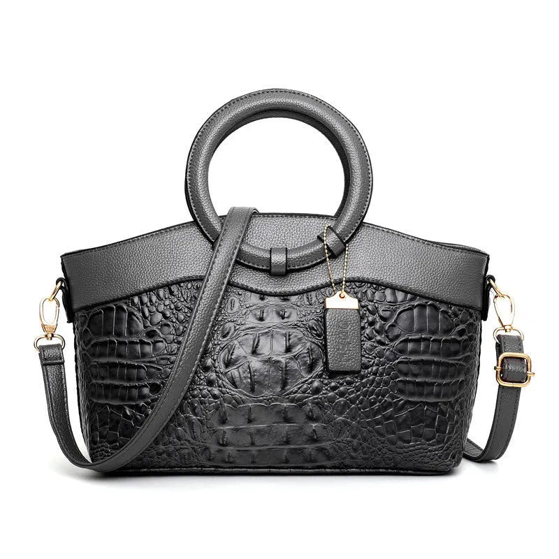 A casual fabric ladies handbag in one of six colours, showing external design and internal phone and ID pockets.