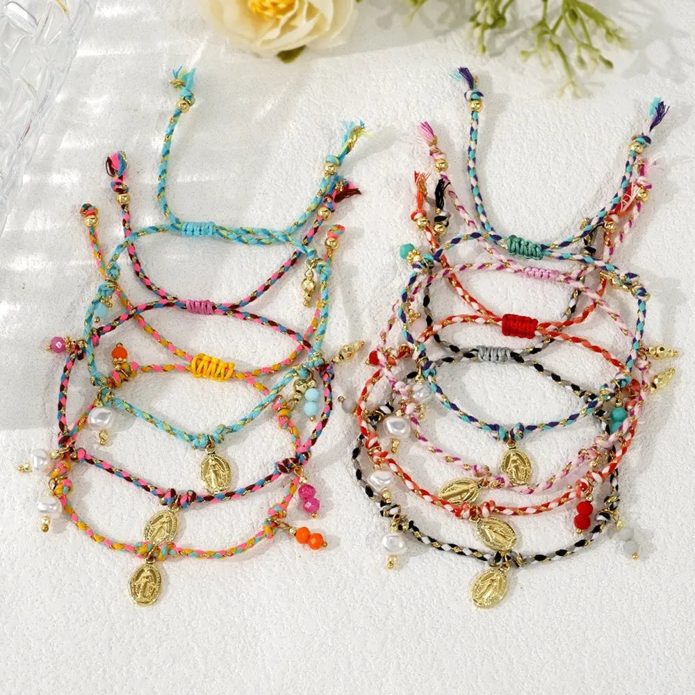 Ethnic style women's bracelet handmade from colourful braided rope with woven carrying strap tag design