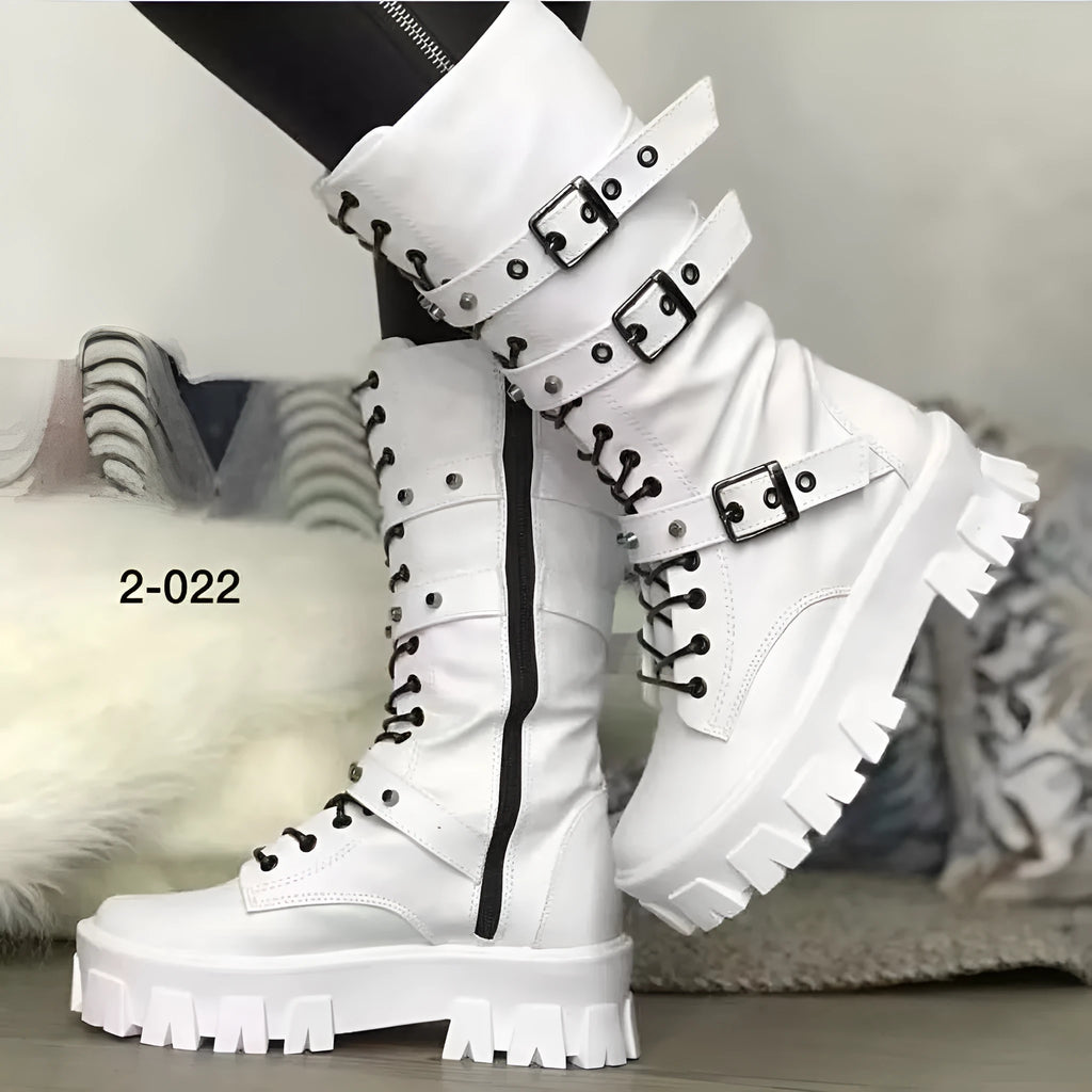 Black women's mid-calf buckle boots with side zip and round toe on a white background.