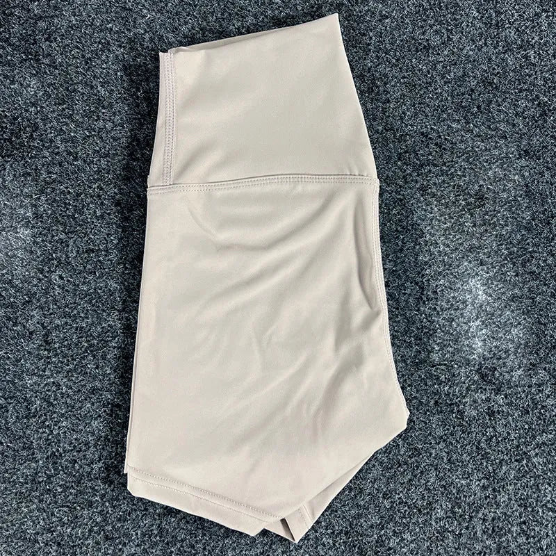 Ladies high waist yoga shorts in nylon fabric, shown in multiple colour options.