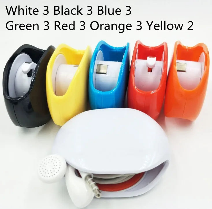Automatic earphone cable retractor winder in a compact plastic storage box.