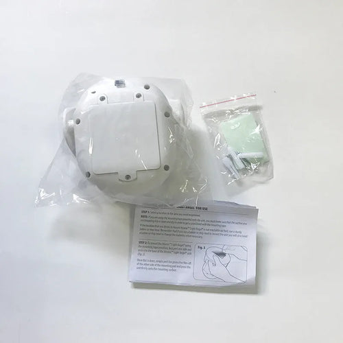 White Atomic Angel induction lamp with ABS plastic housing on a plain background.